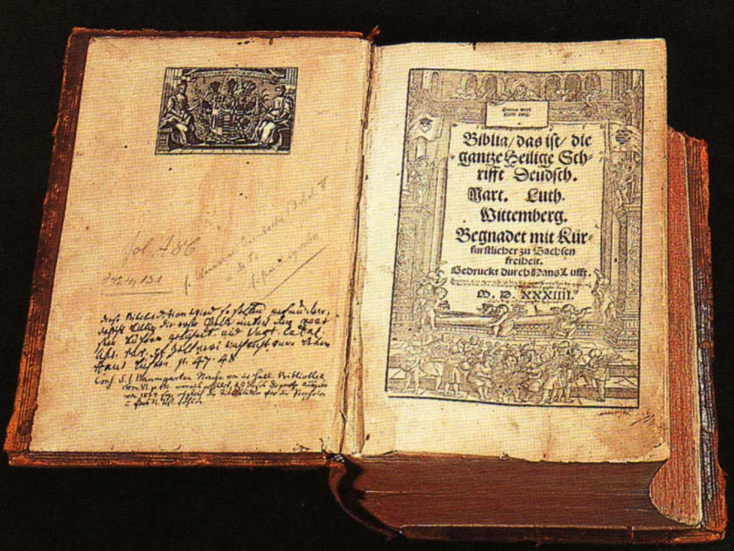 An open religious text from the class slides